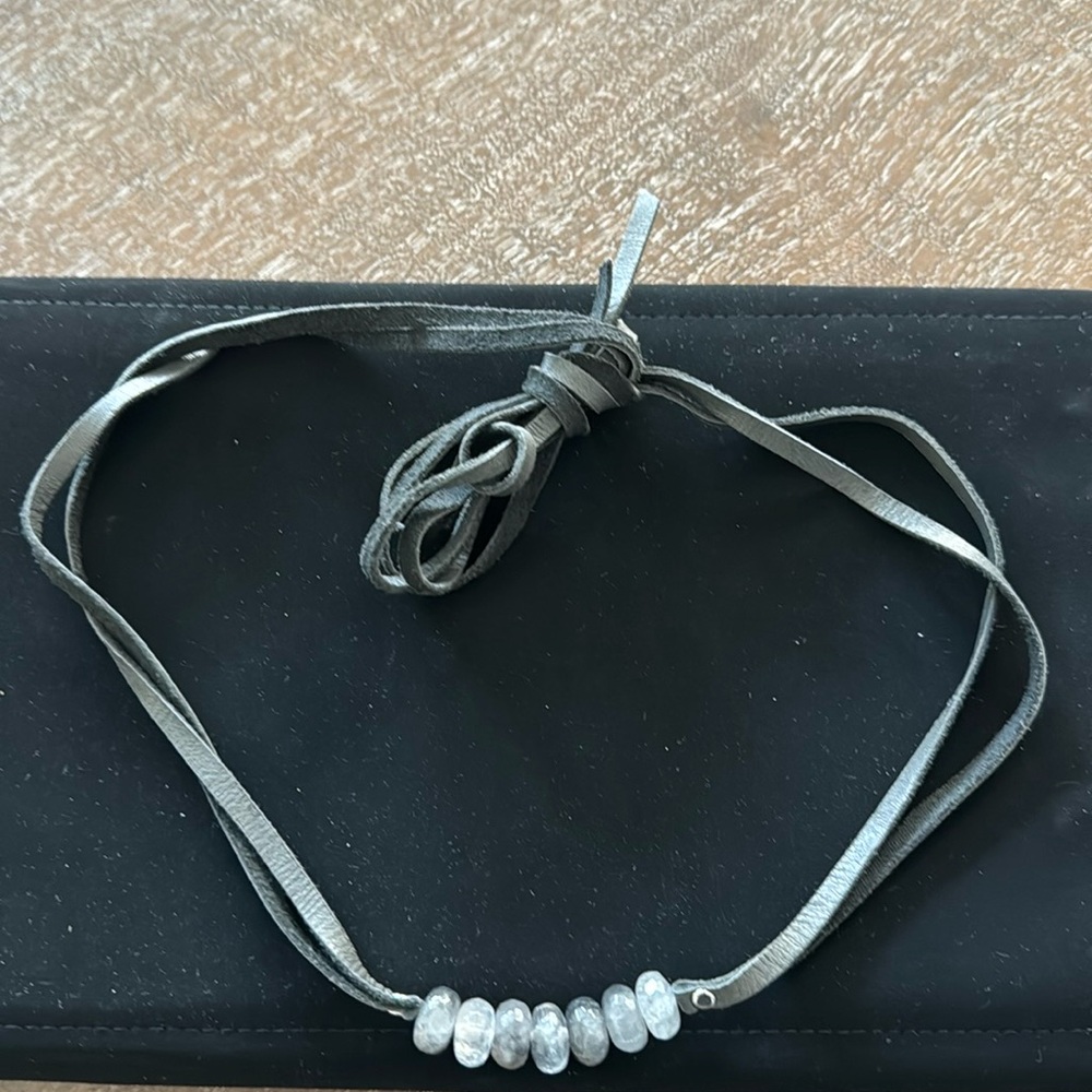 Leather and stone necklace.